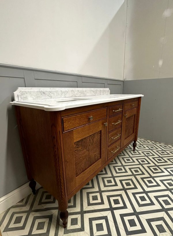 Valencia oak vanity unit with double under mounted basins